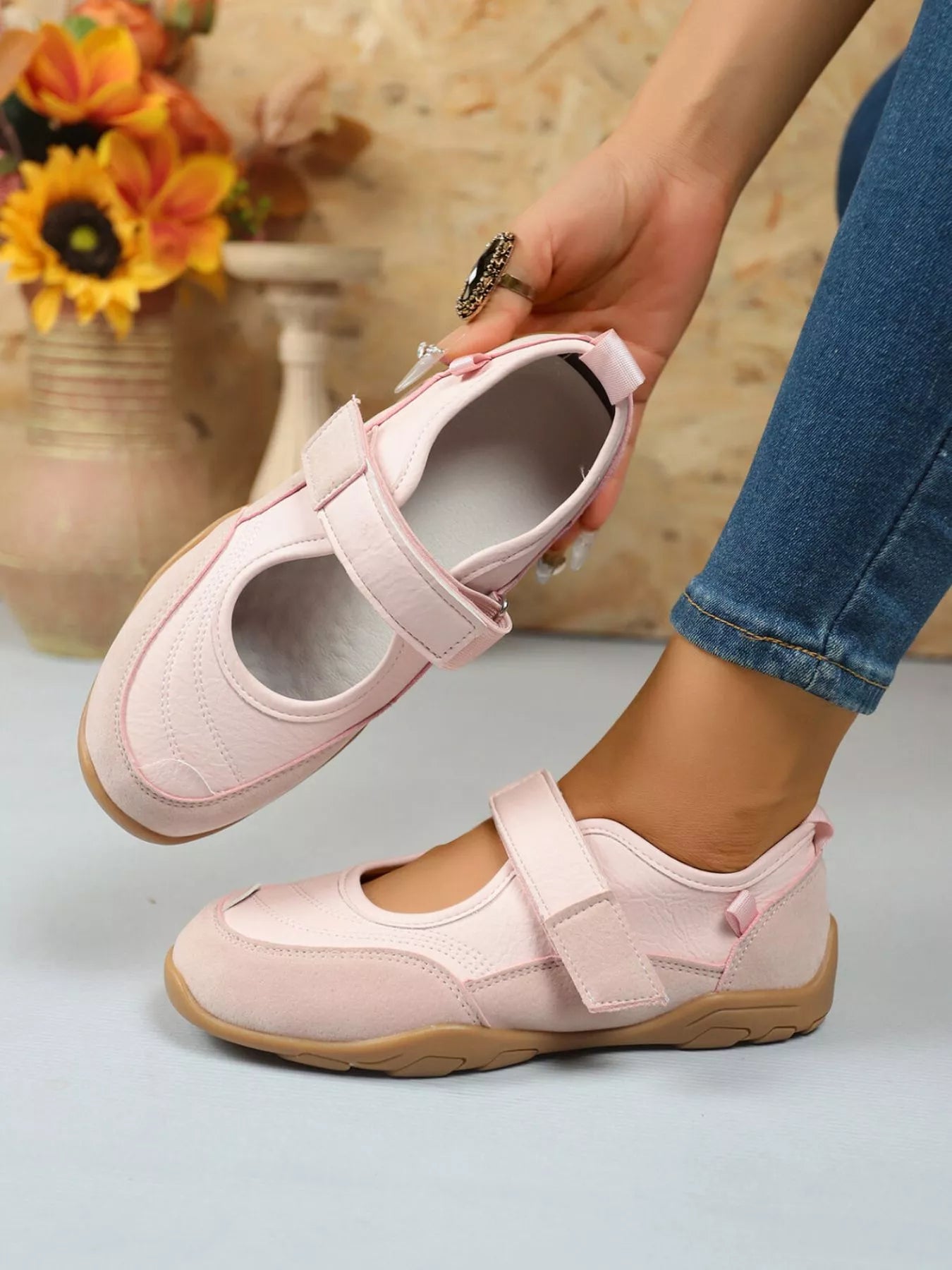 Pink round toe flats with velcro strap – Petal Walk style from A Whimsical Affair.