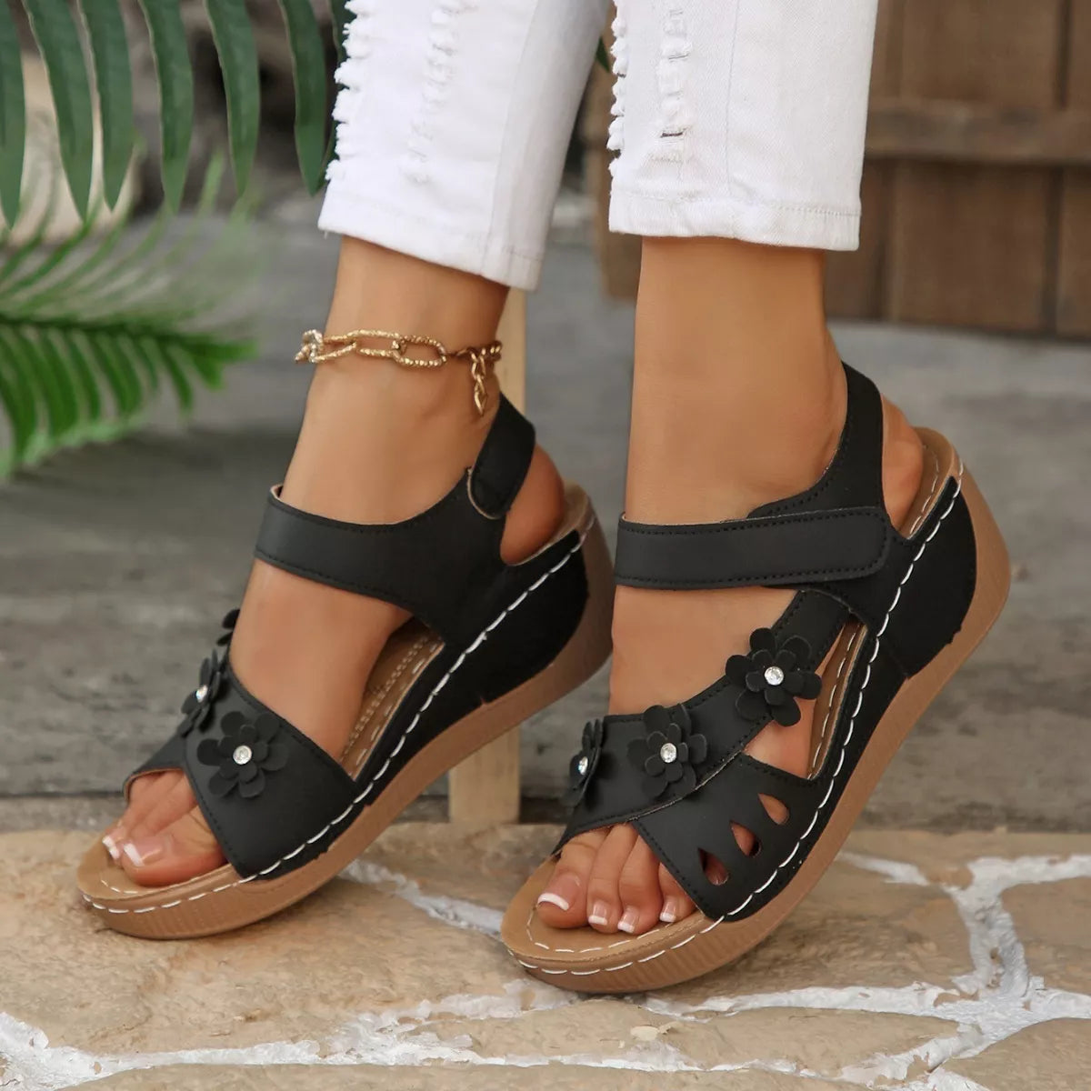 boho platform sandals with floral embellishments and cushioned soles in multiple colorful styles