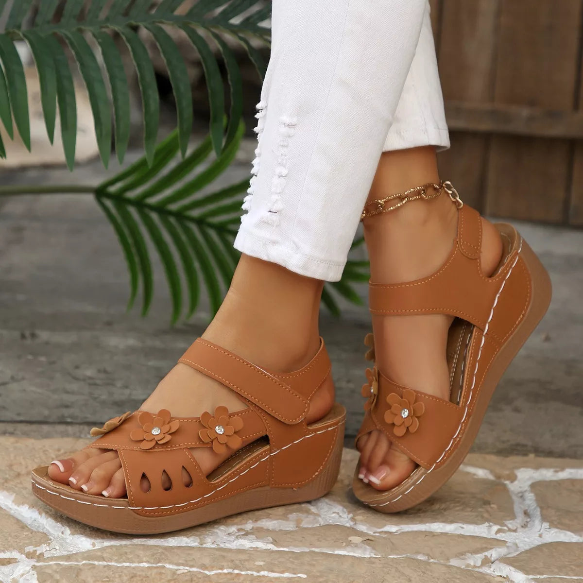 boho platform sandals with floral embellishments and cushioned soles in multiple colorful styles