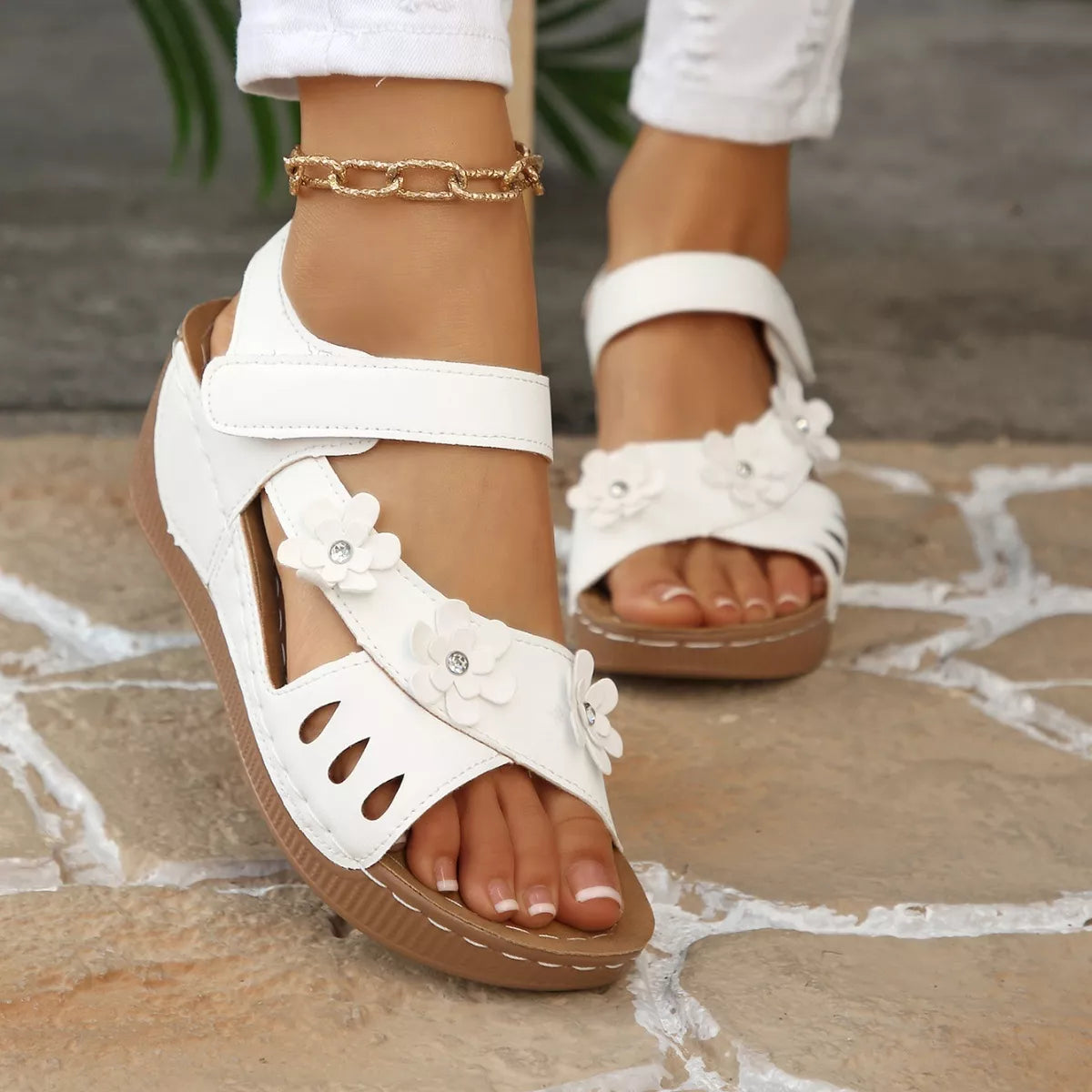 boho platform sandals with floral embellishments and cushioned soles in multiple colorful styles