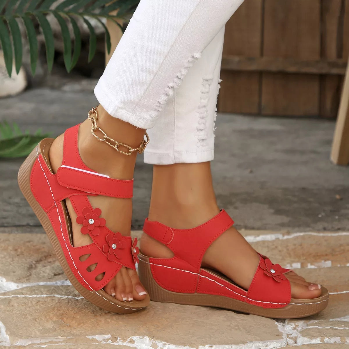 boho platform sandals with floral embellishments and cushioned soles in multiple colorful styles