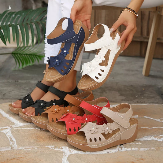 boho platform sandals with floral embellishments and cushioned soles in multiple colorful styles