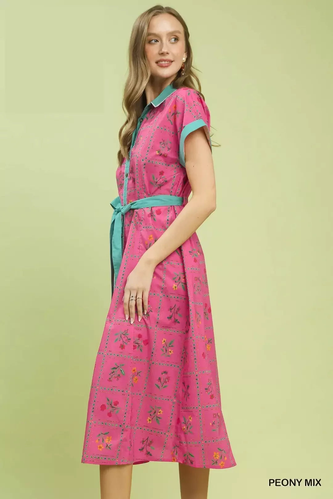 pink floral midi dress with button-front detail and belted waist in a romantic boho style