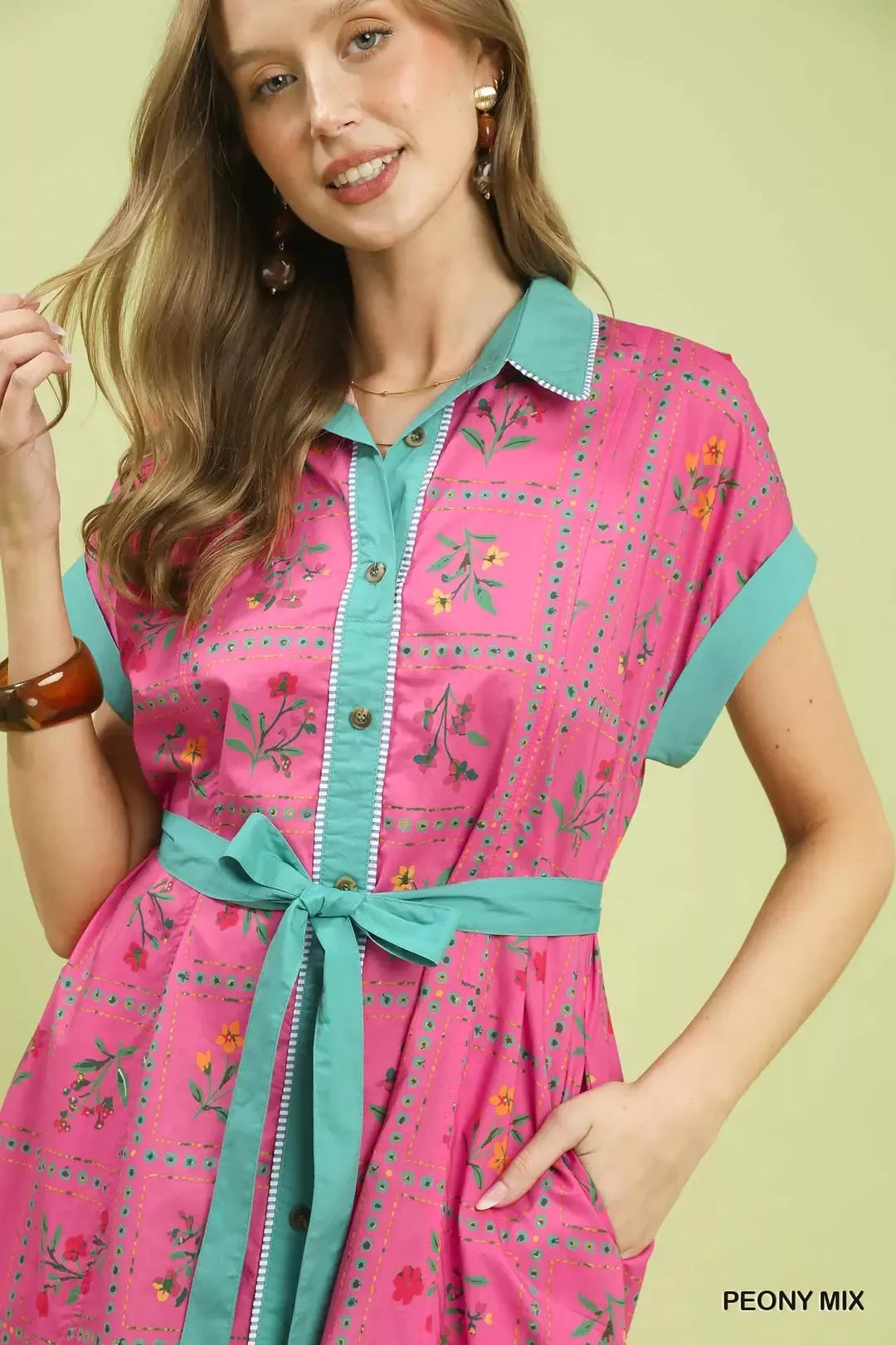 pink floral midi dress with button-front detail and belted waist in a romantic boho style