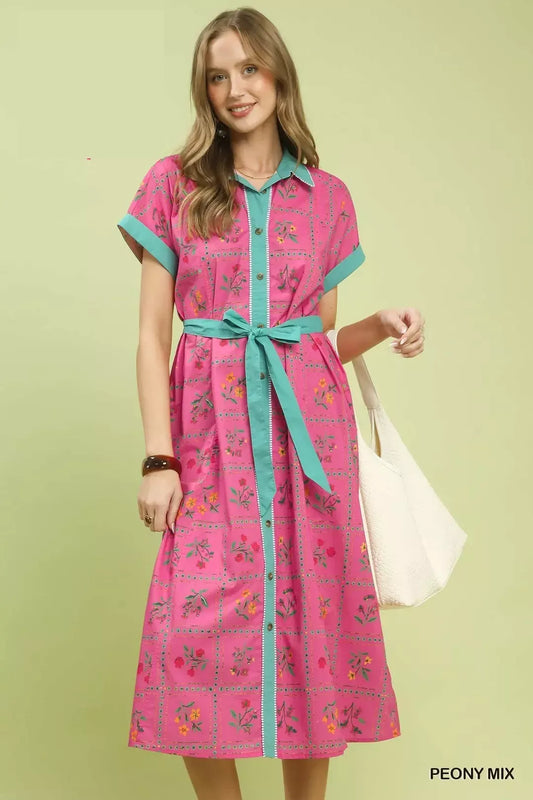 pink floral midi dress with button-front detail and belted waist in a romantic boho style