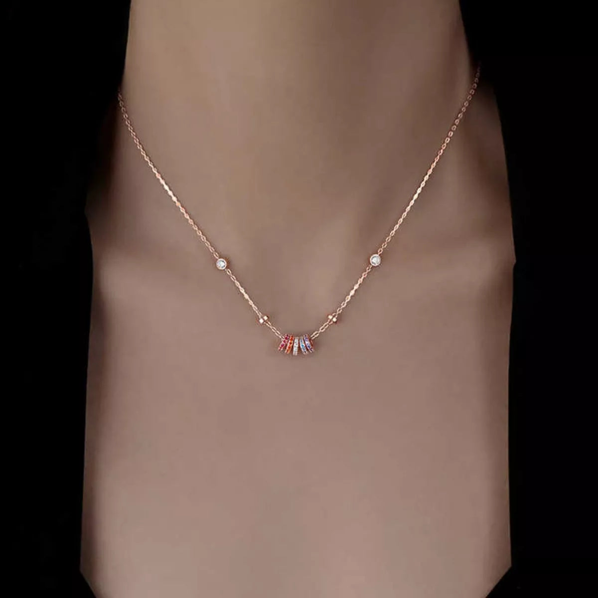 Sterling silver necklace with multicolor zircon ring pendant