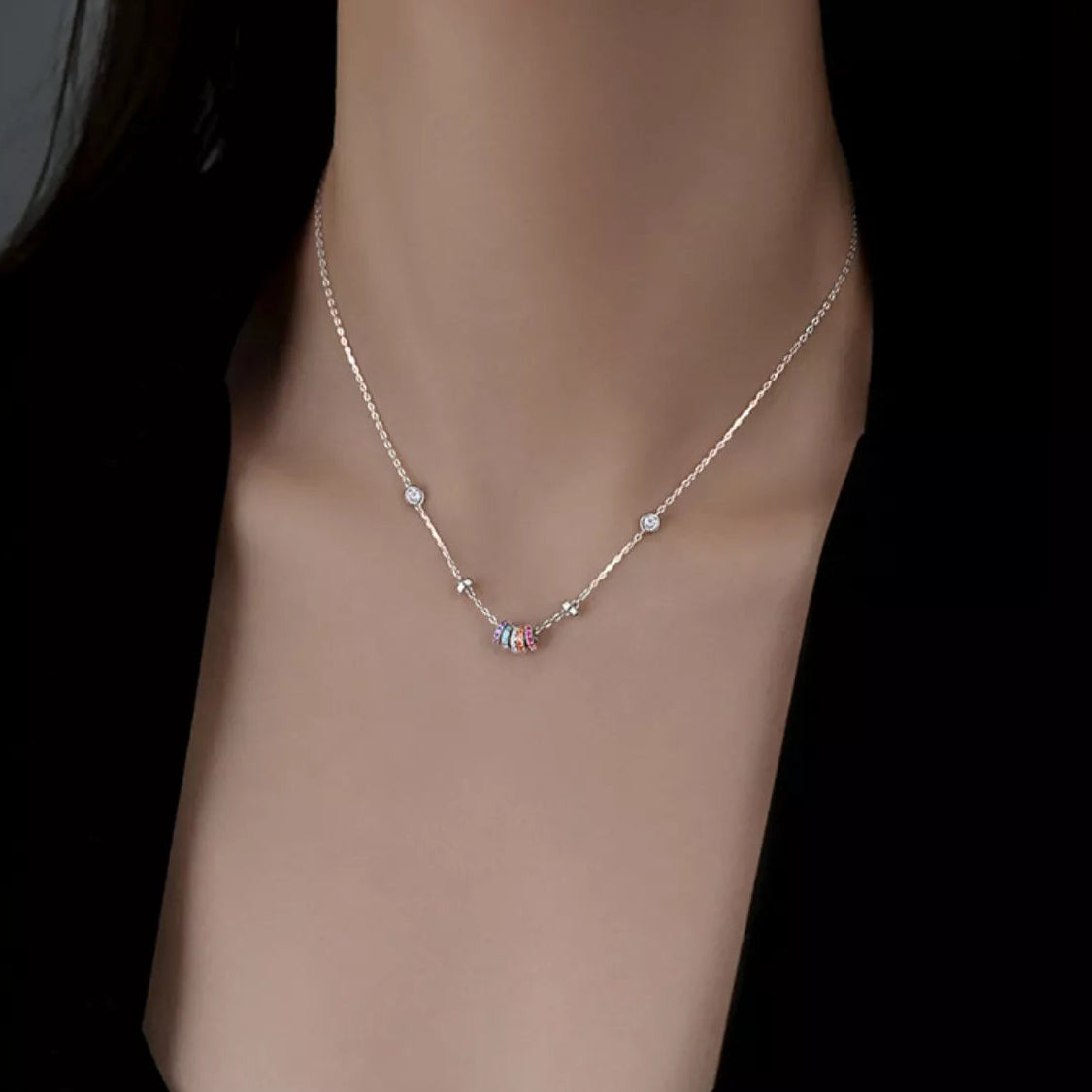 Sterling silver necklace with multicolor zircon ring pendant