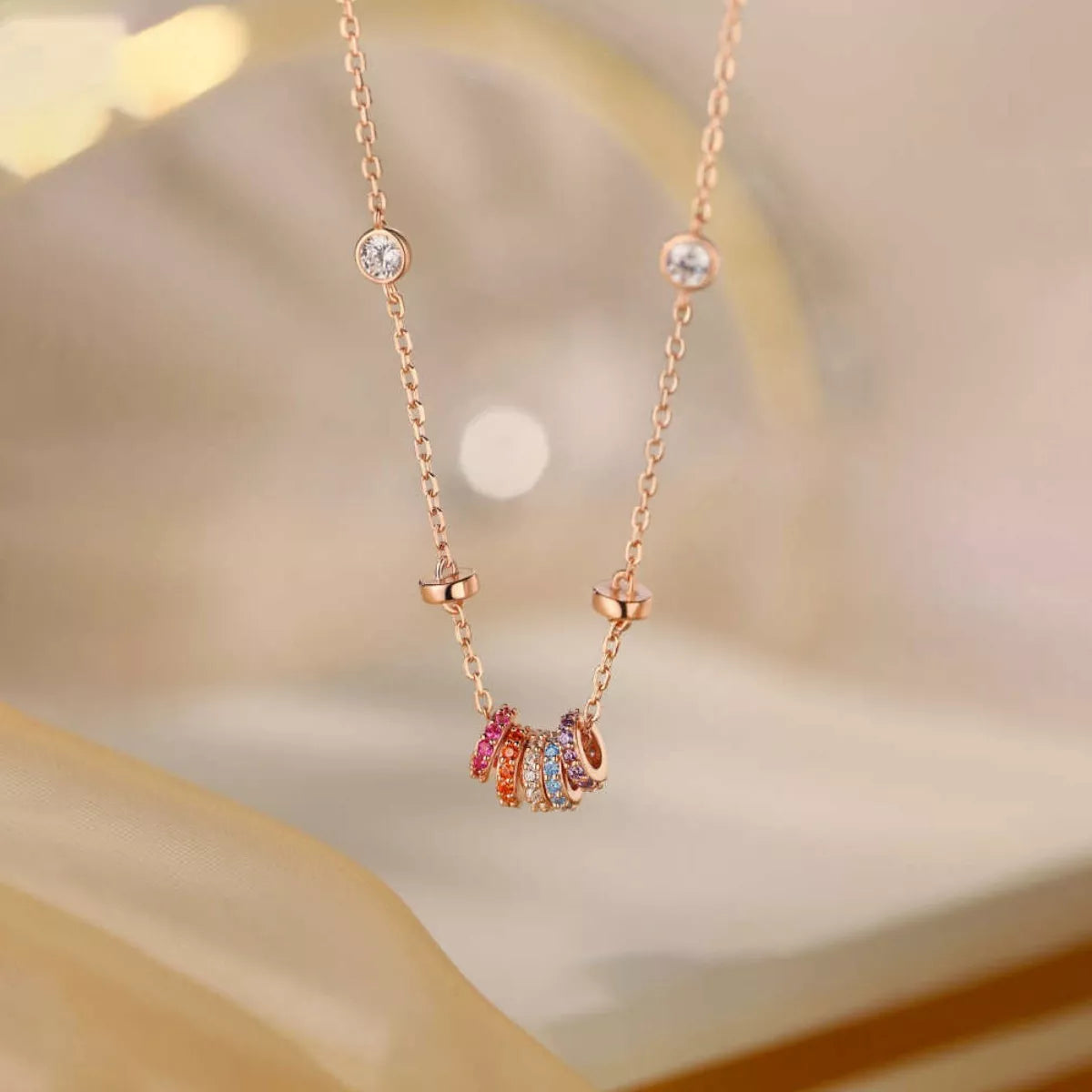 Sterling silver necklace with multicolor zircon ring pendant