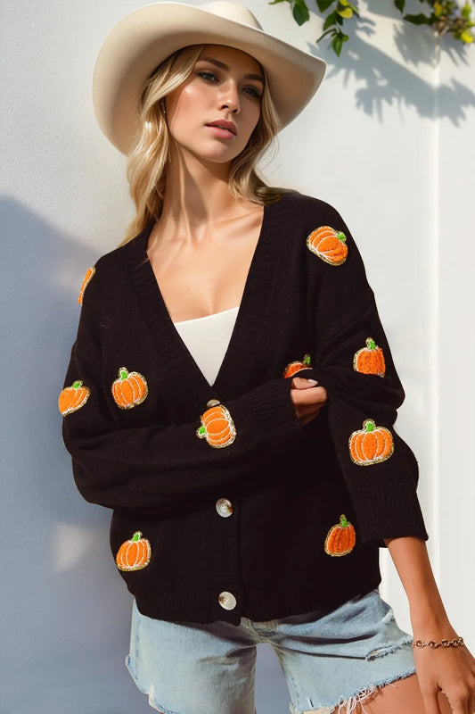 Pumpkin Patch Button Up Cardigan – black button-up sweater with pumpkin appliqués, festive fall knit.