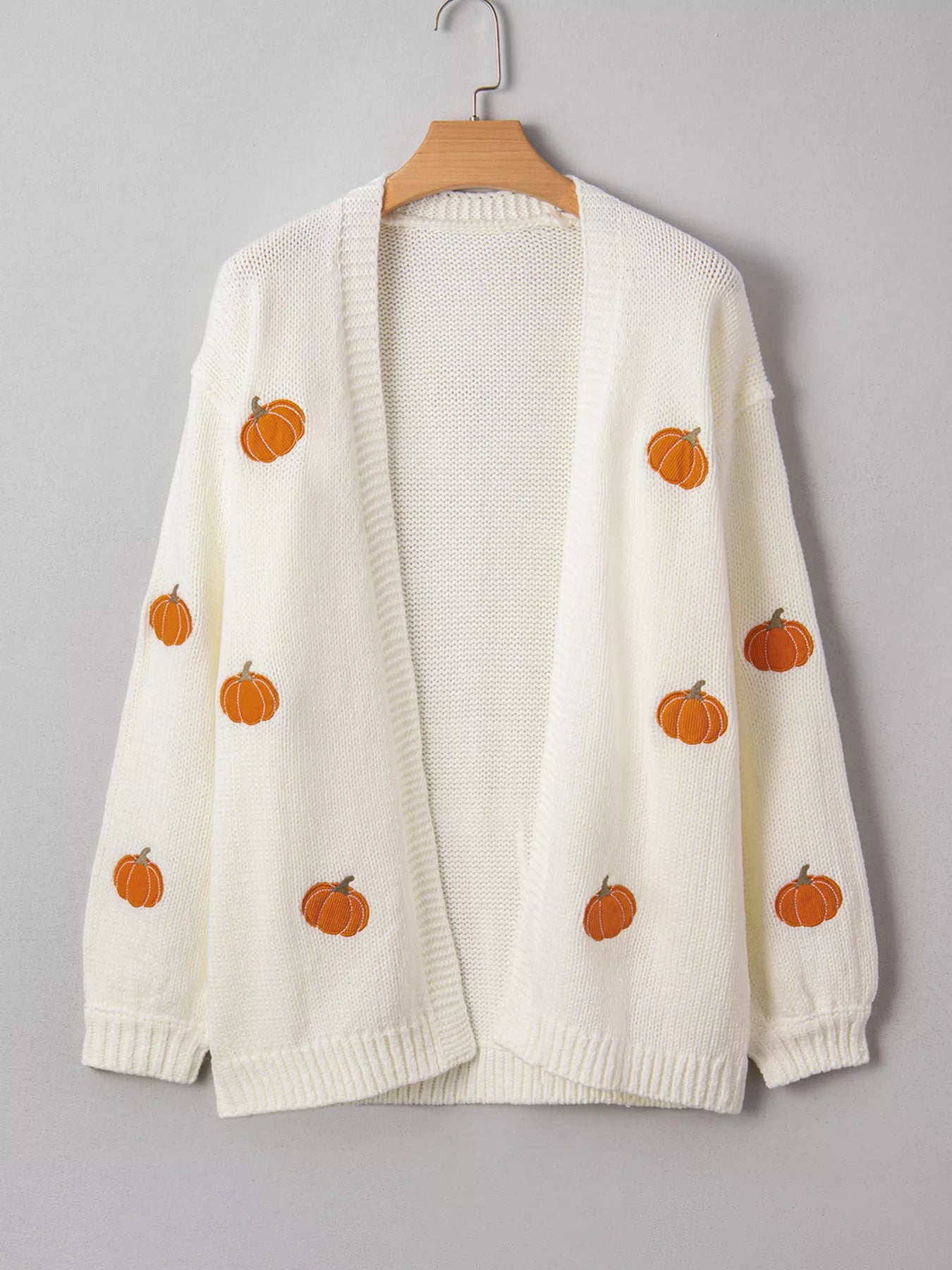 White knit cardigan with orange pumpkin embroidery – Pumpkin Patch style from A Whimsical Affair.