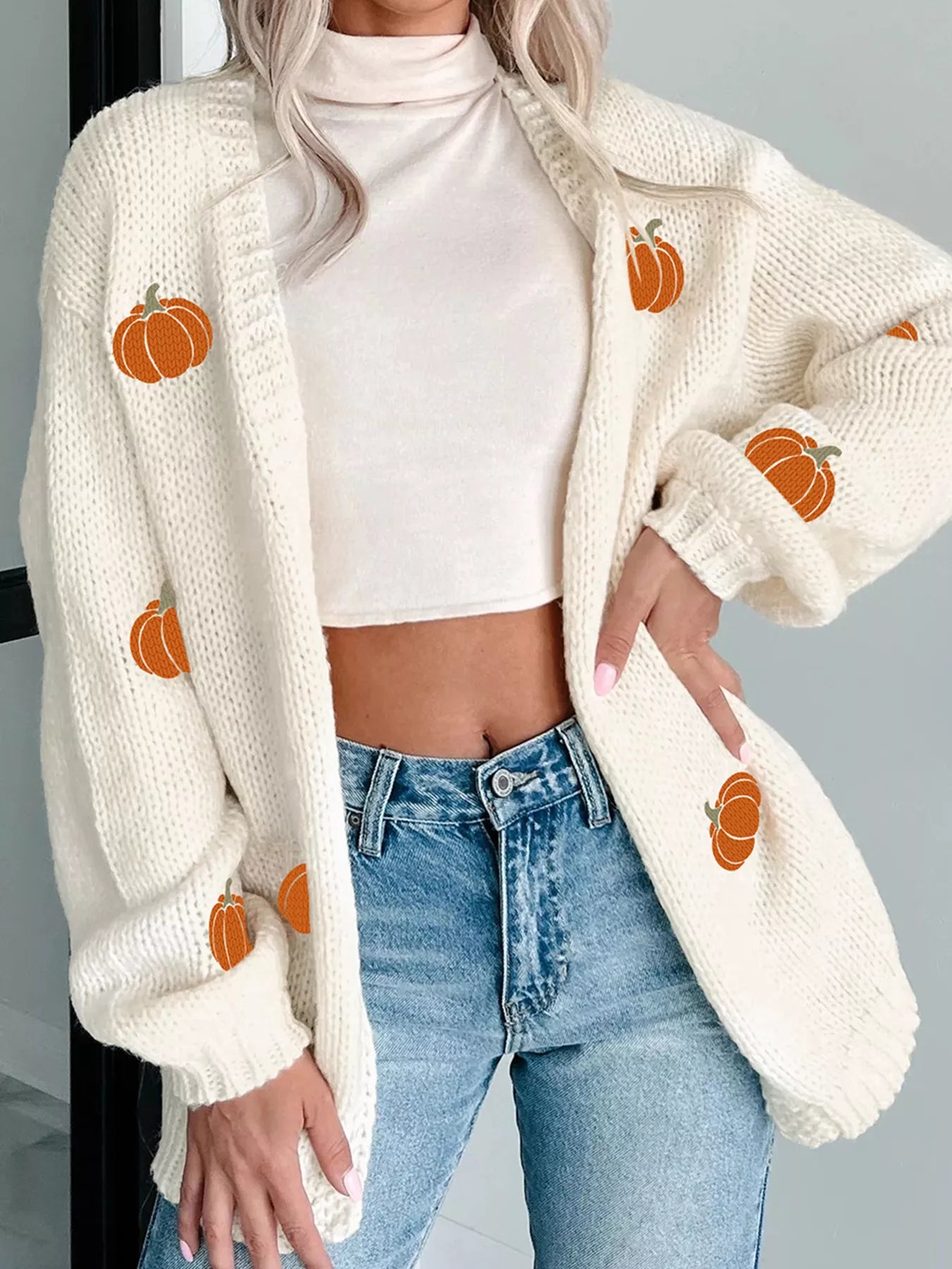 White knit cardigan with orange pumpkin embroidery – Pumpkin Patch style from A Whimsical Affair.