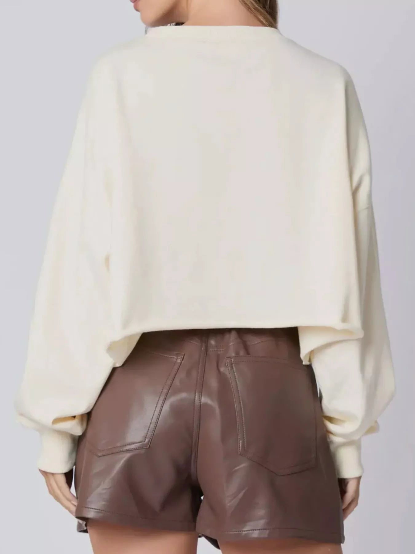 Pumpkin Patch Sparkle Sweatshirt in cream with sequin pumpkins on sleeves – festive autumn top