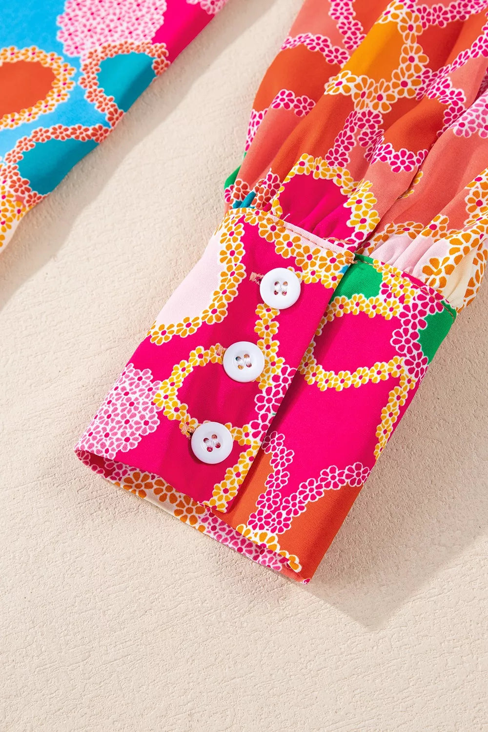 Colorful retro floral button-up blouse with long sleeves