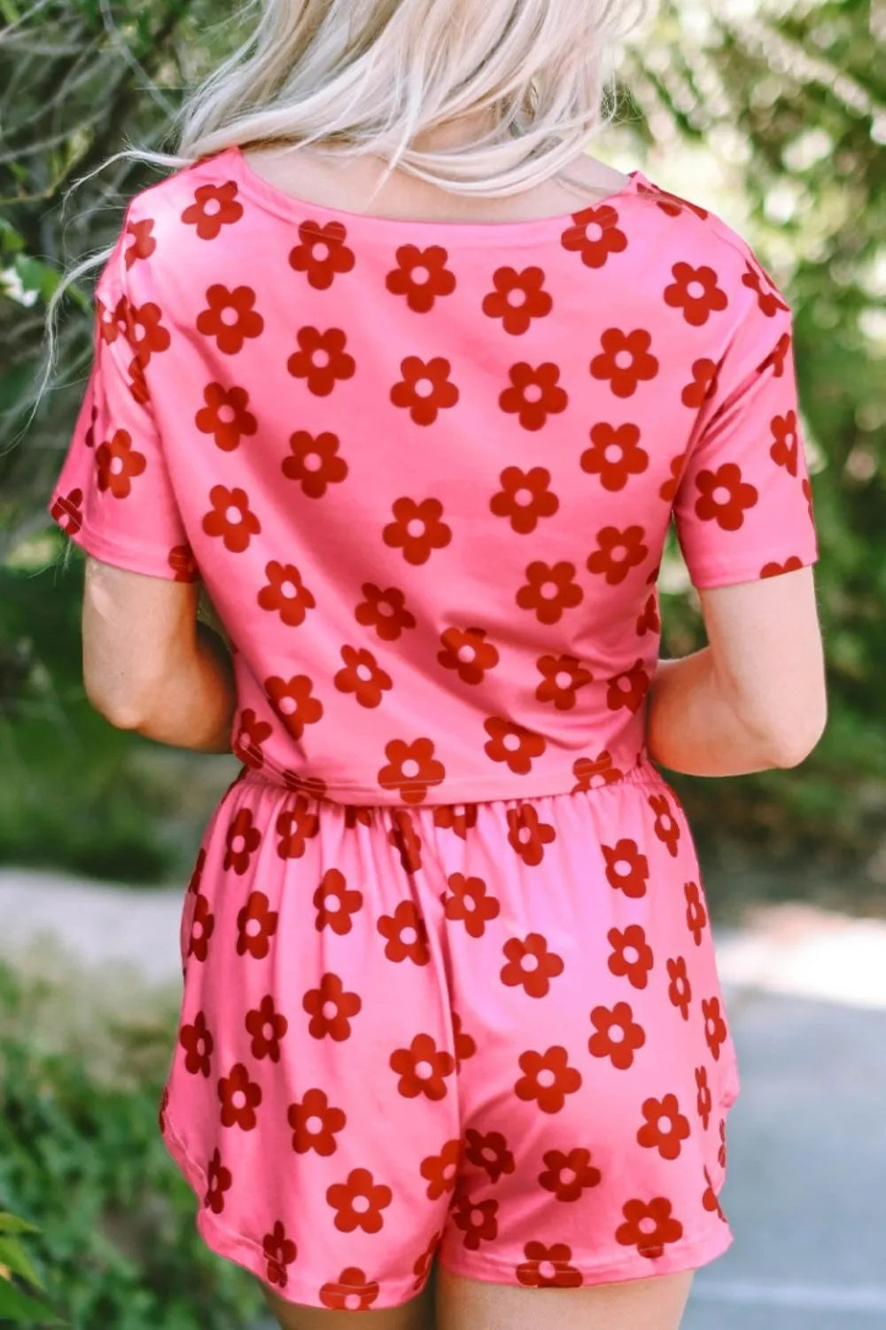 Retro Bloom lounge set in pink with red daisy floral print – cropped tee and shorts two-piece outfit.