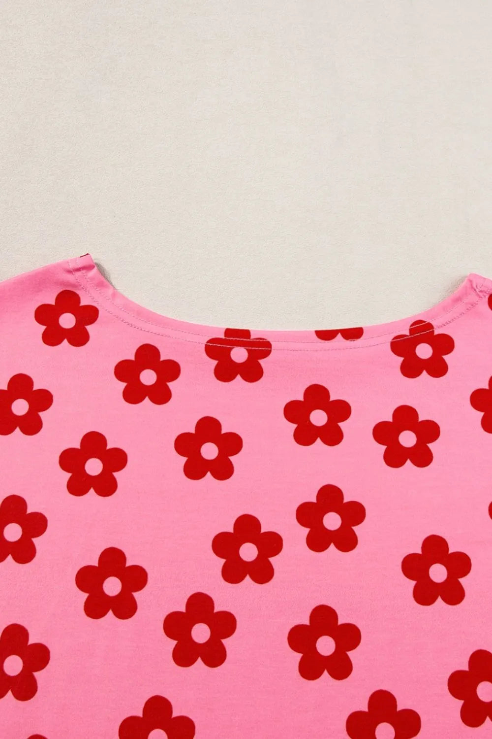 Retro Bloom lounge set in pink with red daisy floral print – cropped tee and shorts two-piece outfit.