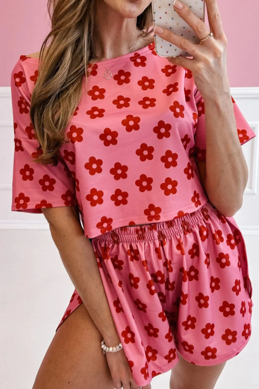 Retro Bloom lounge set in pink with red daisy floral print – cropped tee and shorts two-piece outfit.