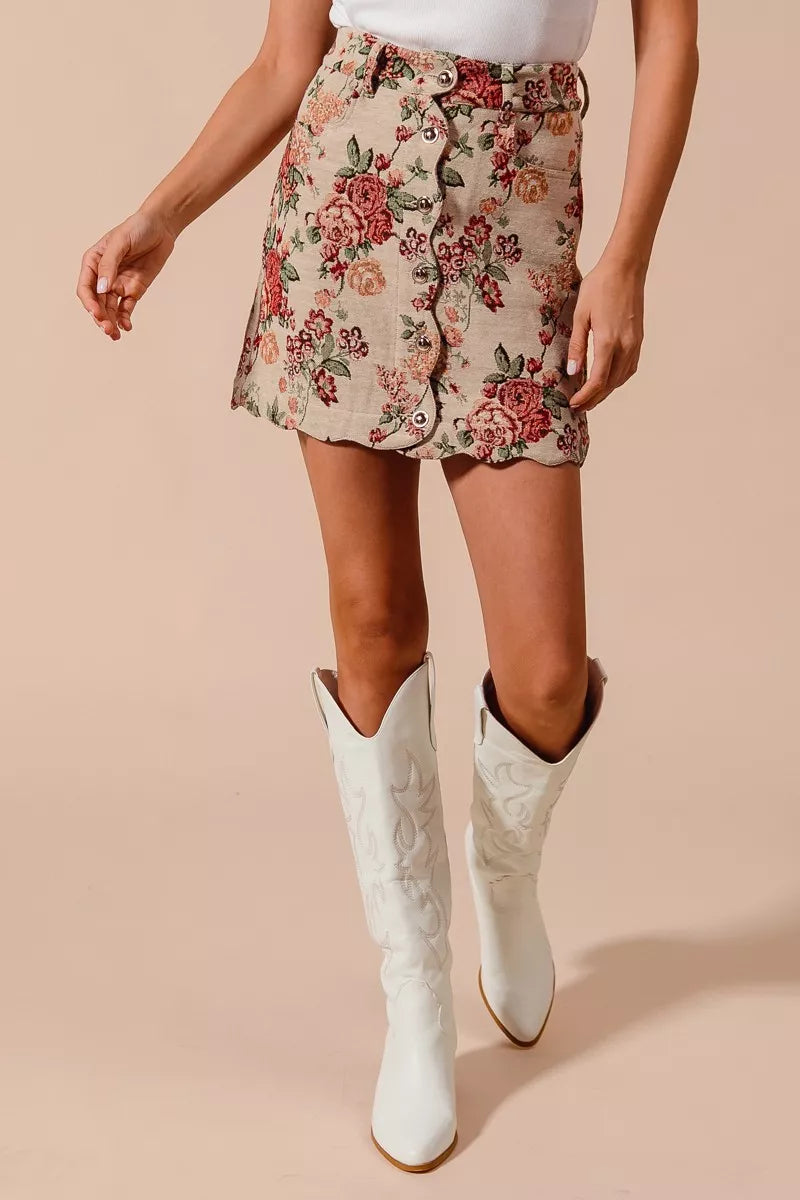 Rosette Charm Jacquard Mini Skirt – floral jacquard fabric with button front and scalloped hem.