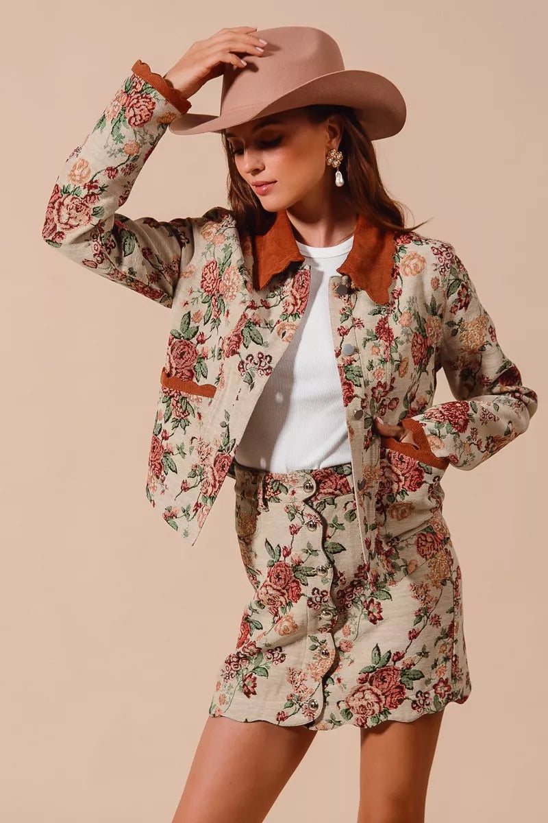Rosette Charm Jacquard Mini Skirt – floral jacquard fabric with button front and scalloped hem.