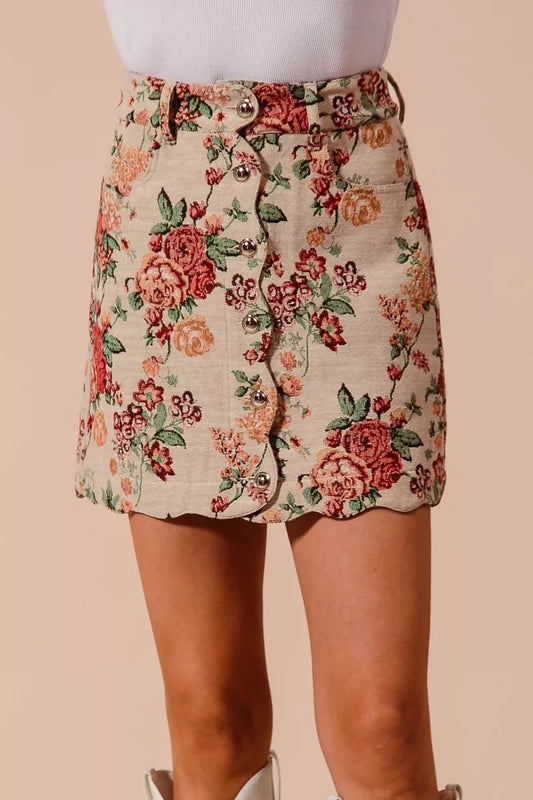 Rosette Charm Jacquard Mini Skirt – floral jacquard fabric with button front and scalloped hem.