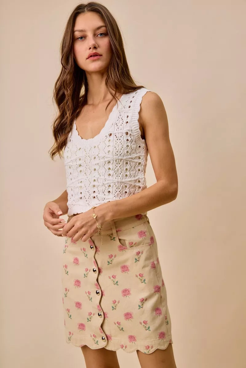 Floral rose print cotton twill mini skirt with scalloped hem and button front closure