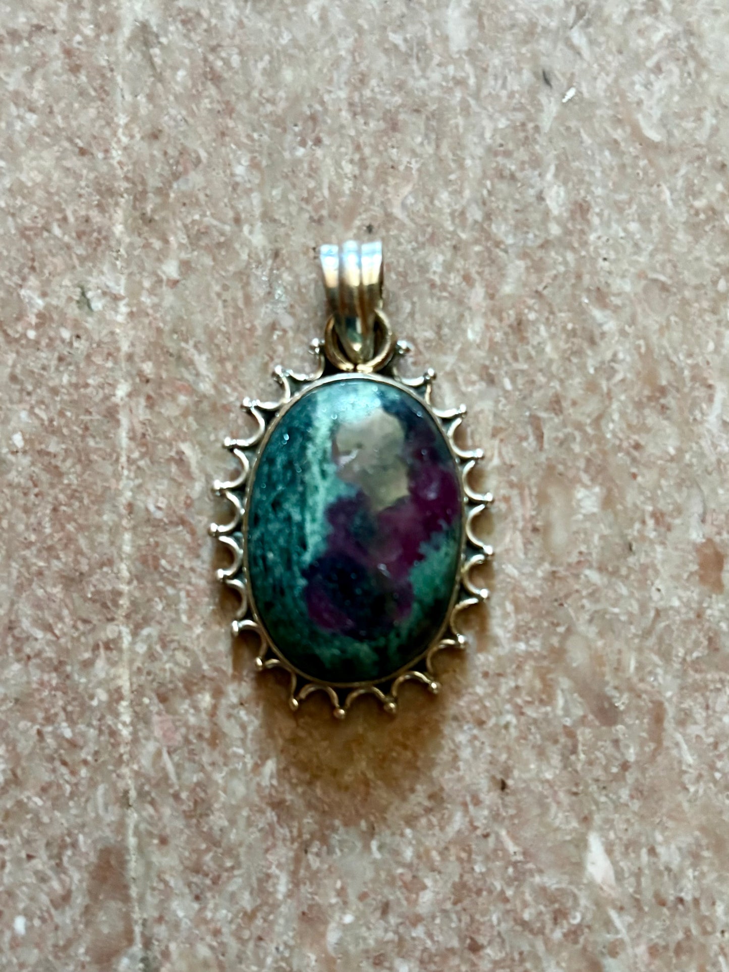 Sterling silver Ruby in Zoisite pendant on black leather cord, featuring green and ruby-toned natural stone with decorative silver edge