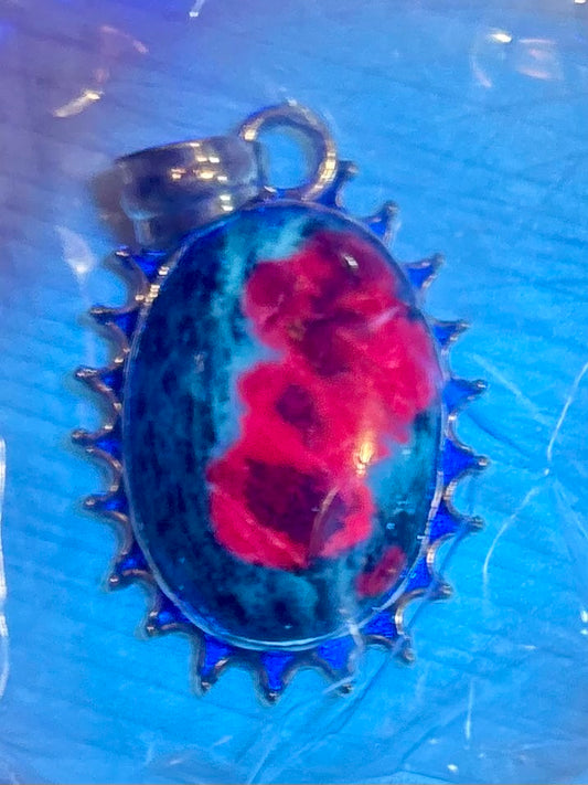 Sterling silver Ruby in Zoisite pendant on black leather cord, featuring green and ruby-toned natural stone with decorative silver edge