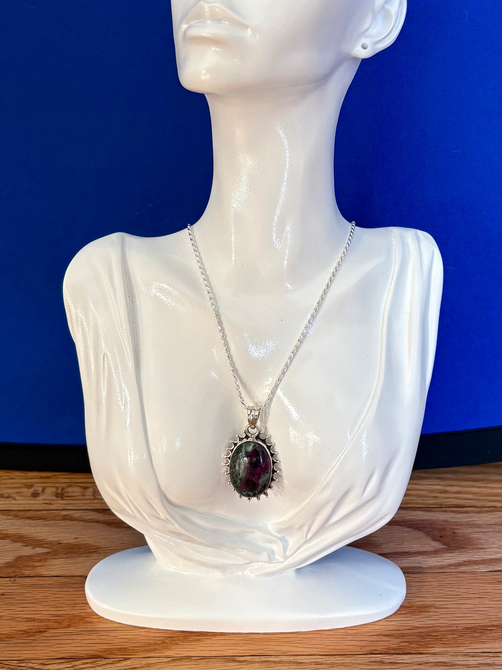Sterling silver Ruby in Zoisite pendant on black leather cord, featuring green and ruby-toned natural stone with decorative silver edge