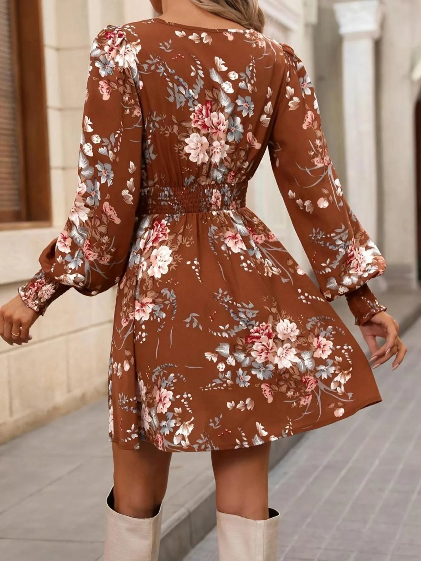 Rustic Rose Smocked Mini Dress in rust with floral print and smocked waist.