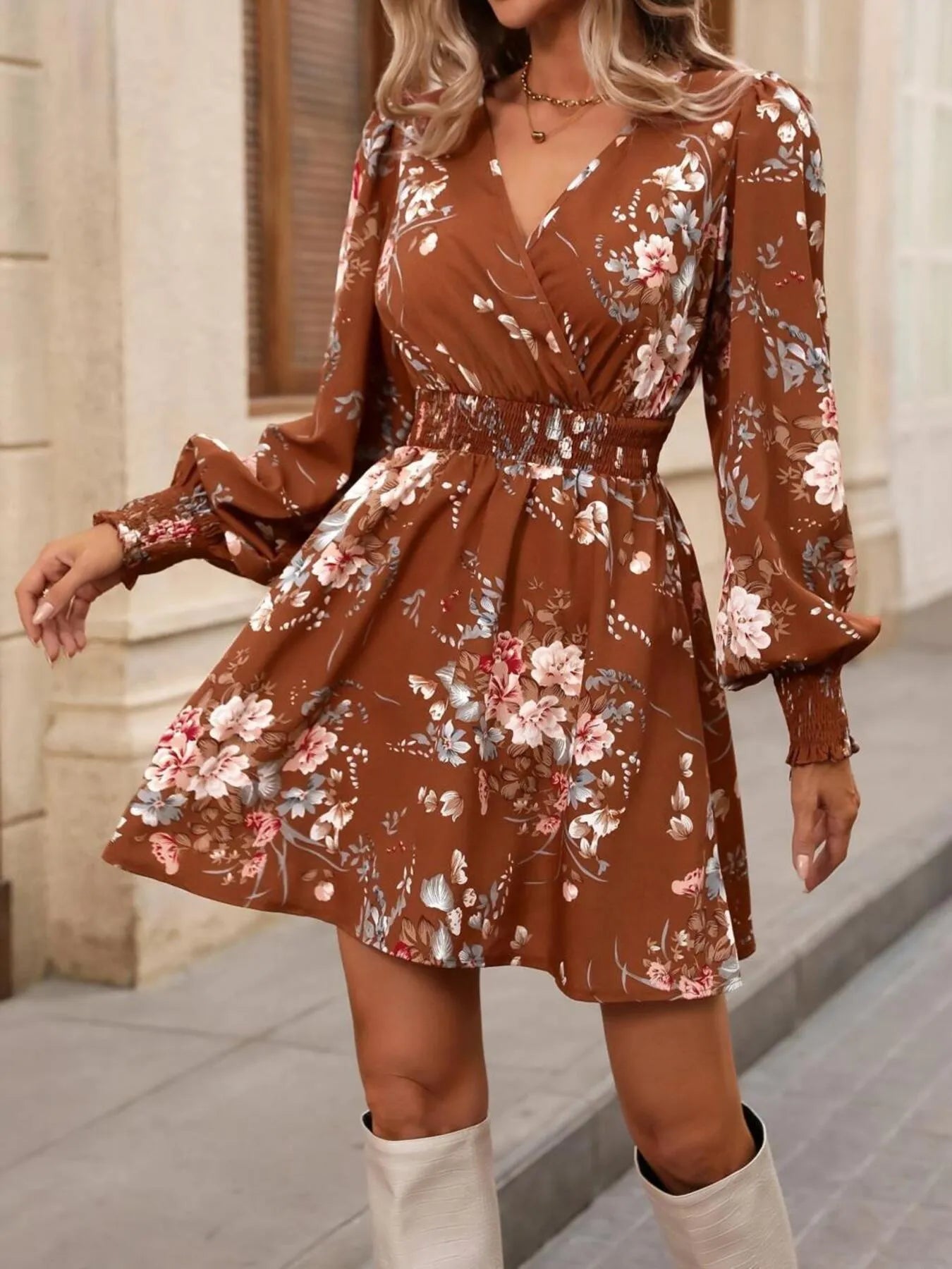 Rustic Rose Smocked Mini Dress in rust with floral print and smocked waist.