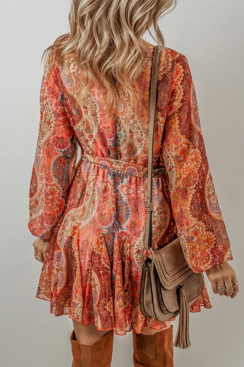 Boho paisley wrap mini dress in rust and sage tones with long sleeves and tie waist