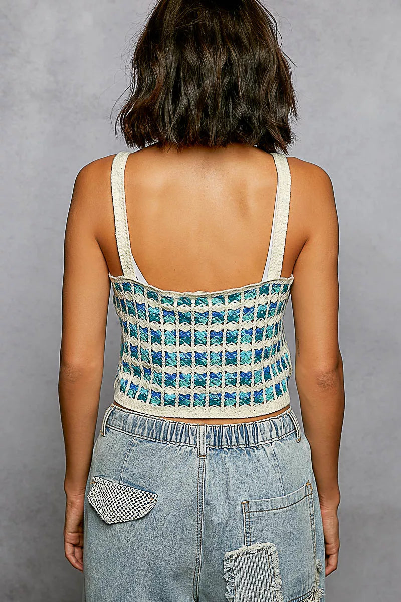 crochet cropped top with scalloped edges in blue and cream colors