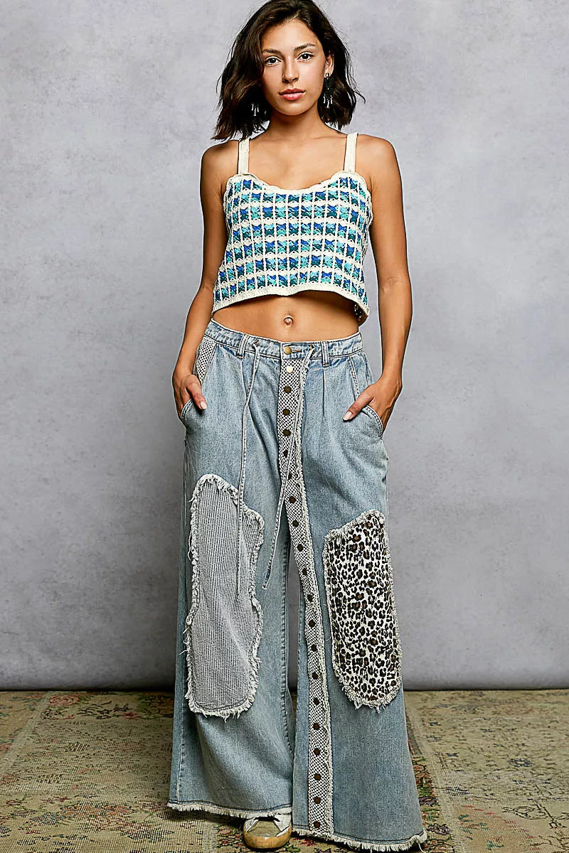 crochet cropped top with scalloped edges in blue and cream colors