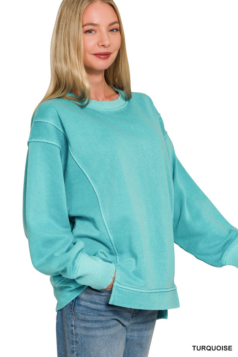 Turquoise relaxed-fit sweatshirt with seam detailing and ribbed cuffs