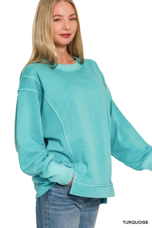 Turquoise relaxed-fit sweatshirt with seam detailing and ribbed cuffs