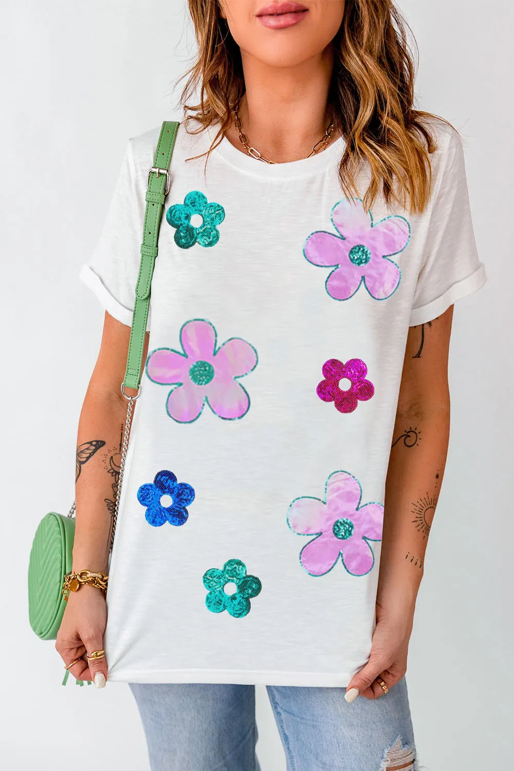 White short sleeve t-shirt with colorful sequin floral designs