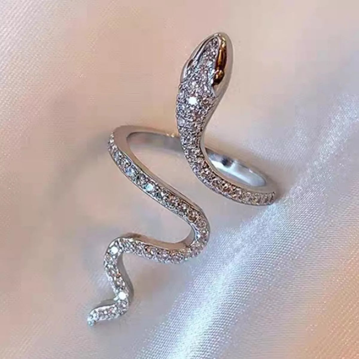 Adjustable silver snake wrap ring with sparkling zircon stones