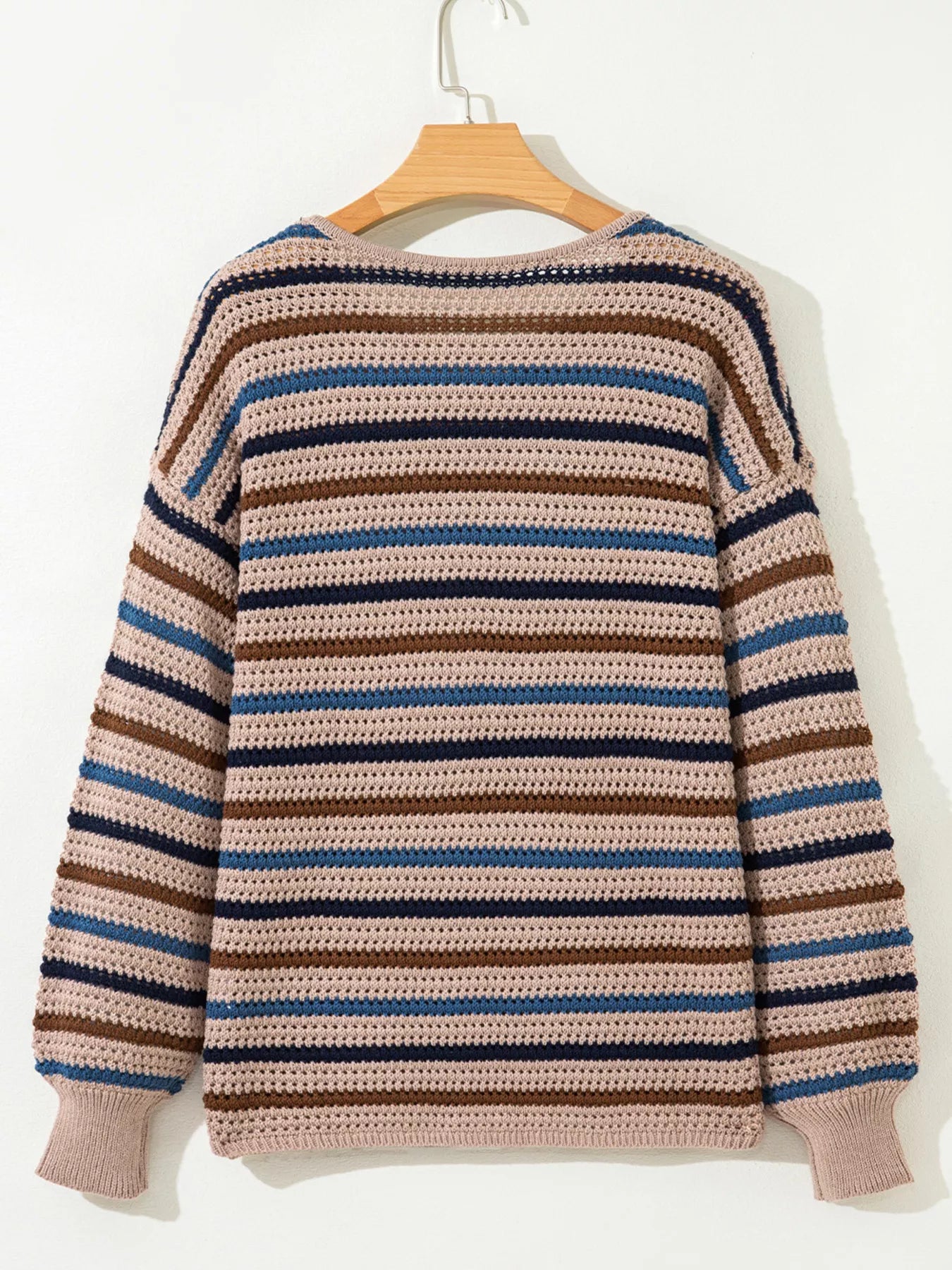 Brown and blue striped knit sweater with relaxed fit and cozy long sleeves