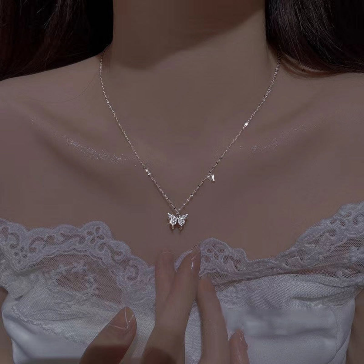 Sterling silver butterfly pendant necklace with zircon detail