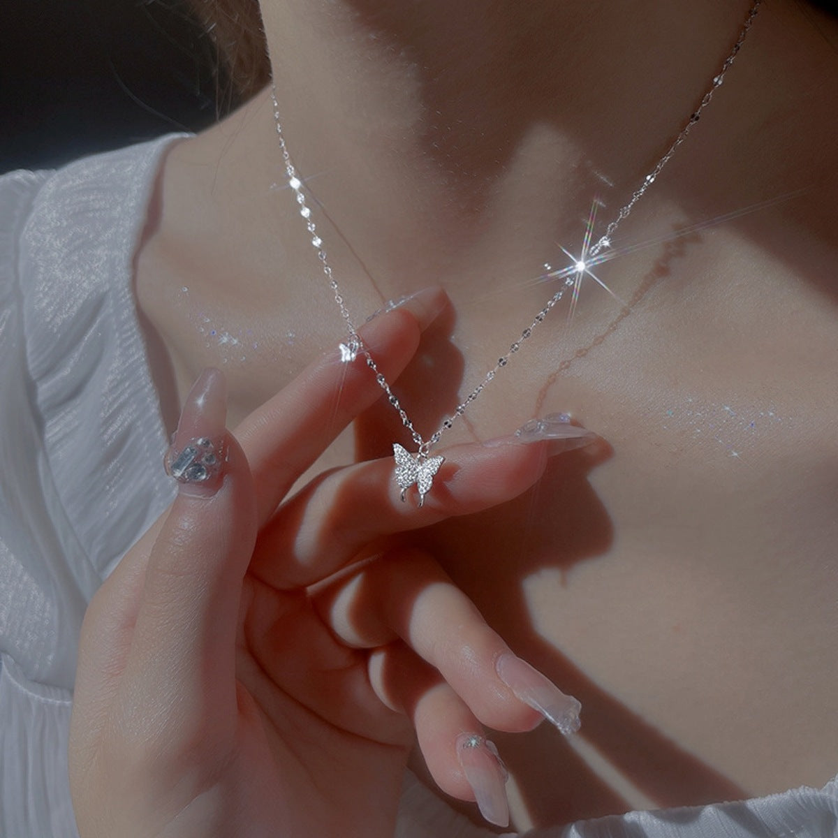 Sterling silver butterfly pendant necklace with zircon detail