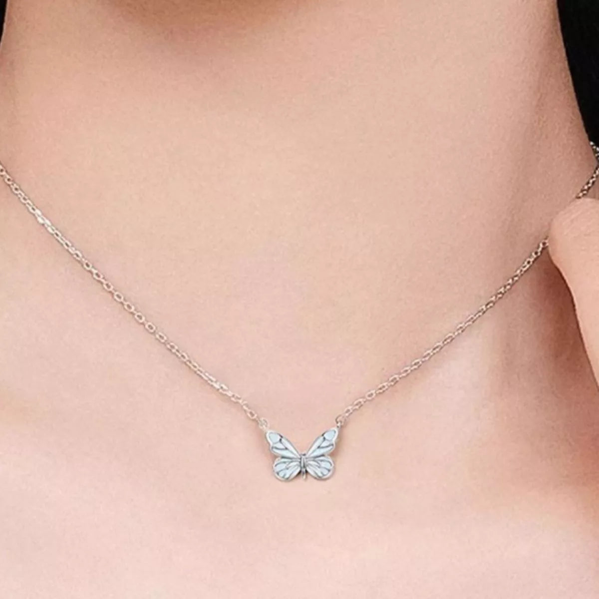 Sterling silver butterfly necklace with openwork wing design