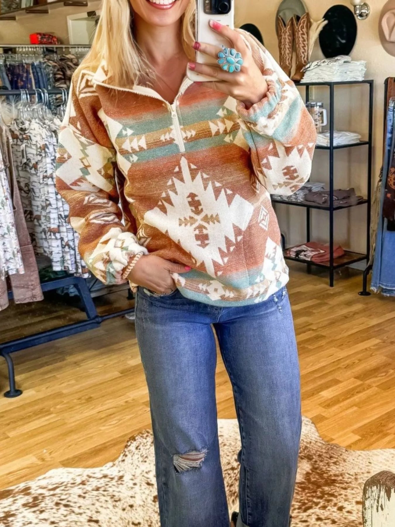 Camel Aztec print quarter zip sweatshirt with elastic cuffs.