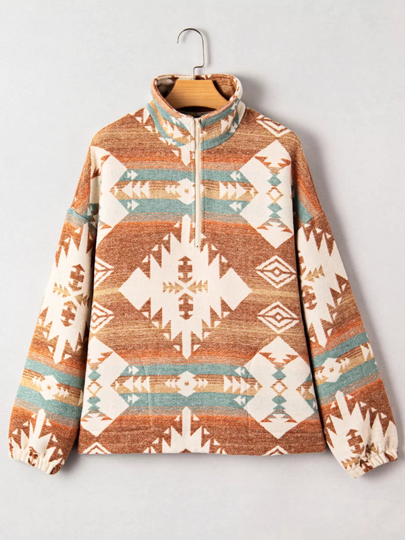 Camel Aztec print quarter zip sweatshirt with elastic cuffs.