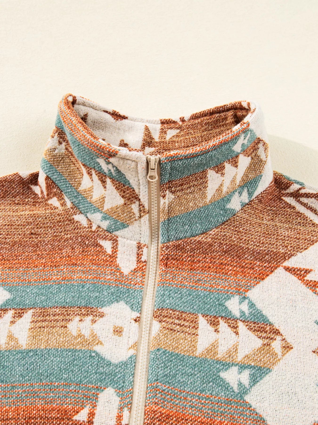 Camel Aztec print quarter zip sweatshirt with elastic cuffs.