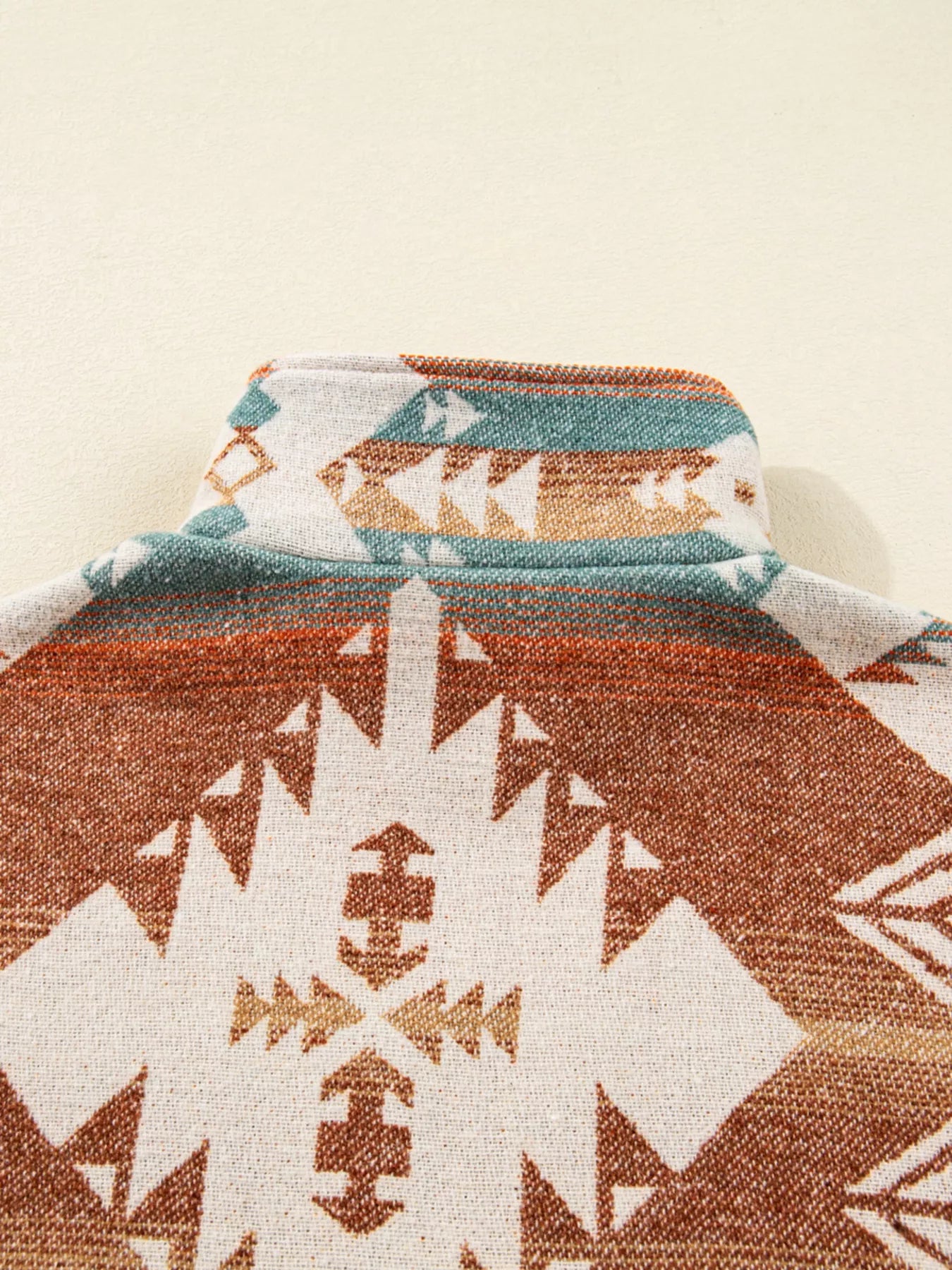 Camel Aztec print quarter zip sweatshirt with elastic cuffs.
