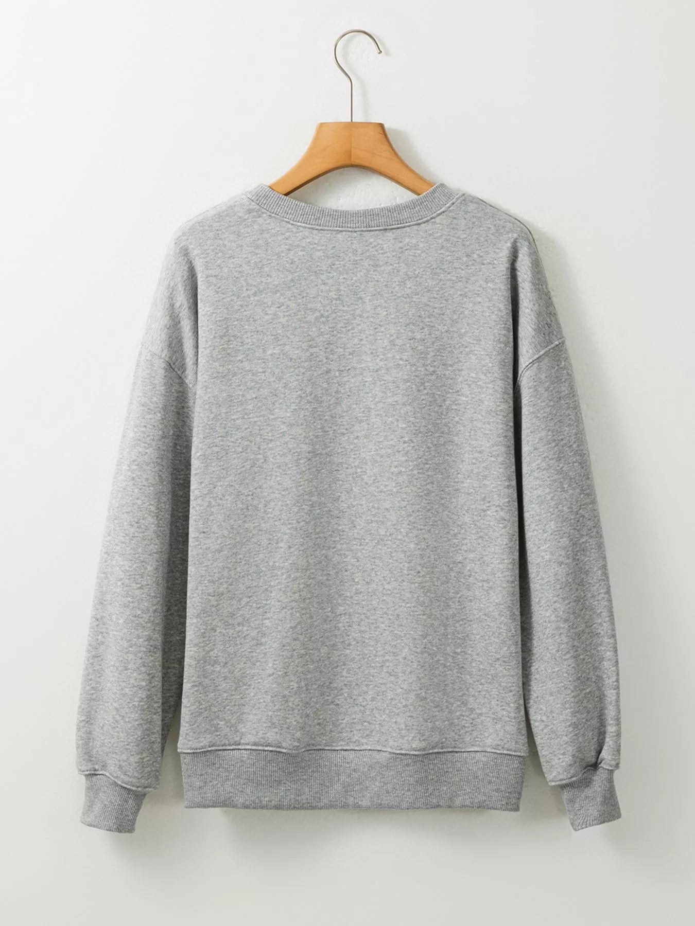 Grey Halloween sweatshirt with white ghosts and colorful sequin “SPOOKY” lettering – Sparkle Spooky style from A Whimsical Affair.
