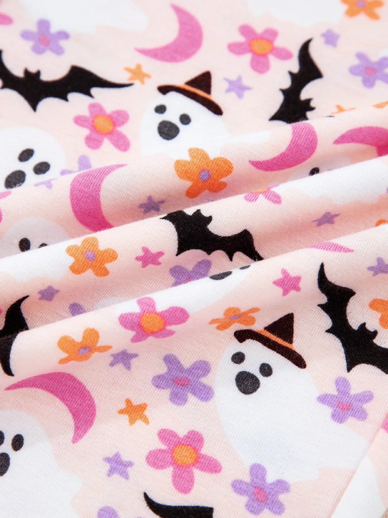 Halloween ghost print two-piece lounge set with button-up top and pants – Spooky Comfort style from A Whimsical Affair.