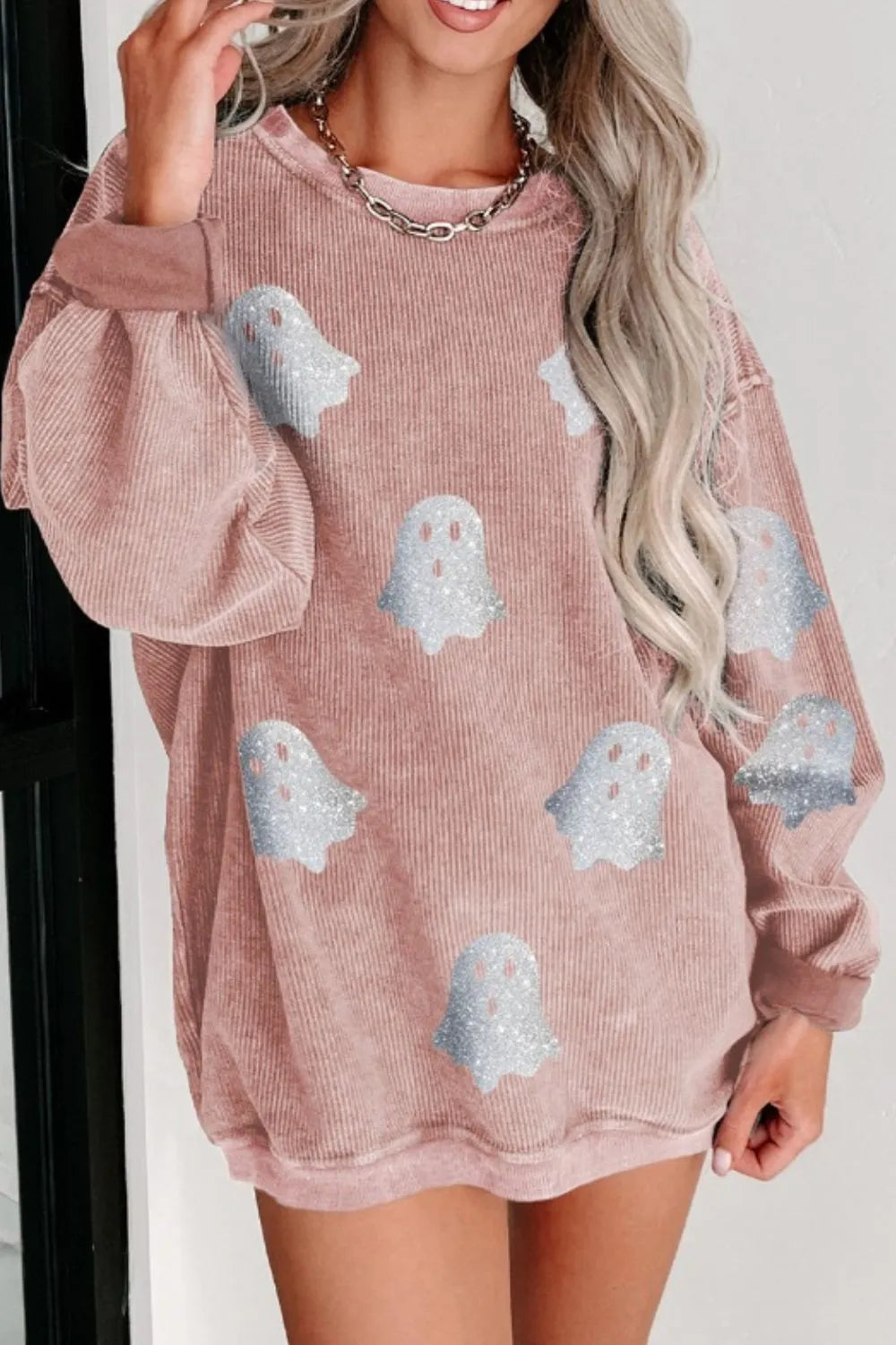 Spooky Cozy Oversized Ghost Sweatshirt – pink oversized round neck sweatshirt with ghost print, Halloween loungewear.