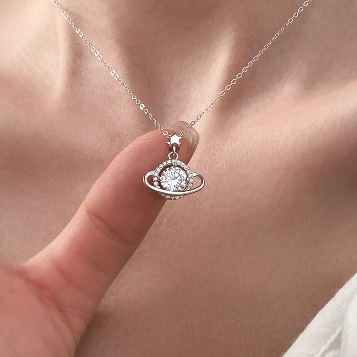 sterling silver celestial orbit necklace with 1ct moissanite pendant and star charm