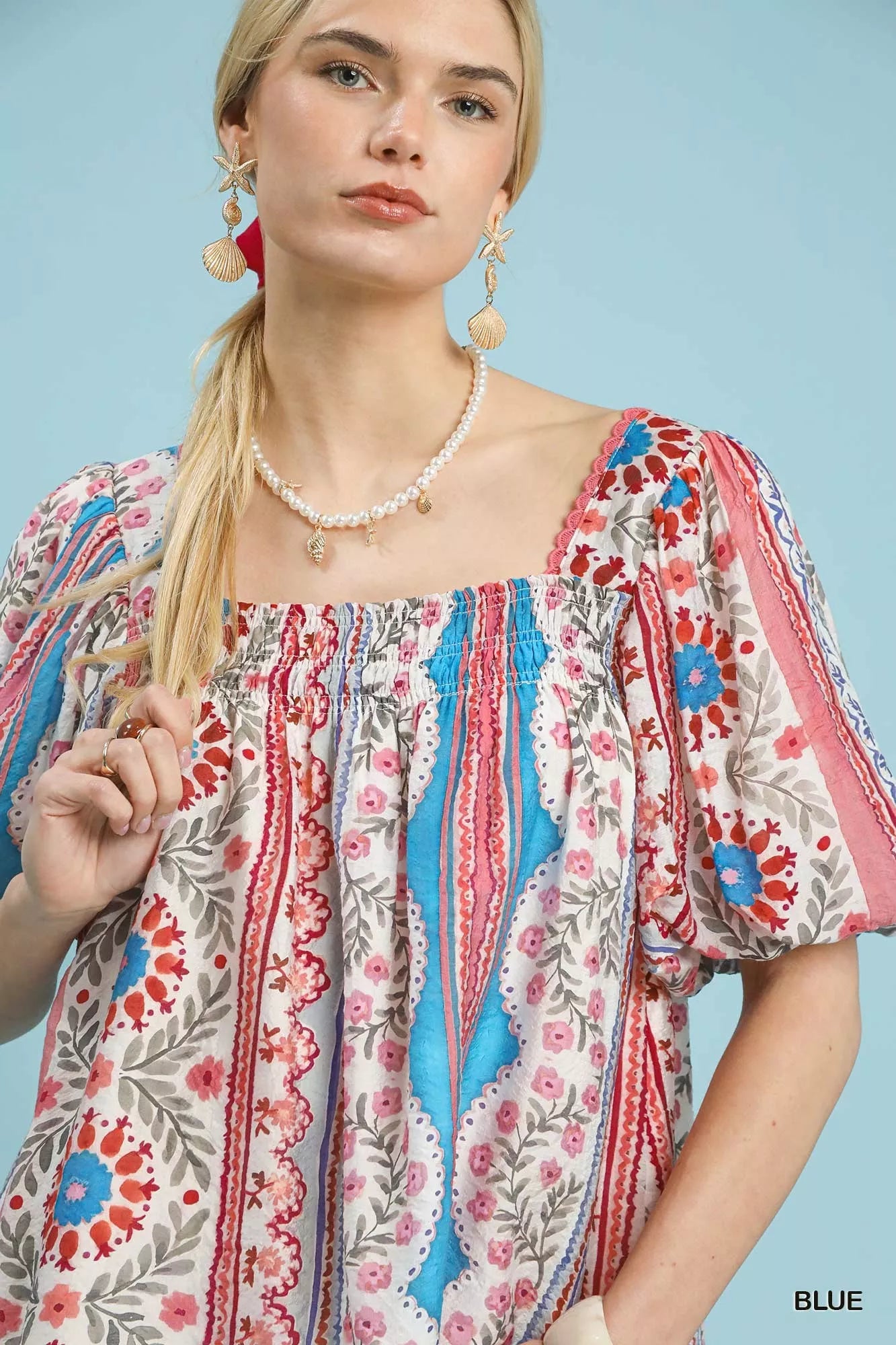 Patchwork puff sleeve smocked top with floral and stripe patterns and square neckline