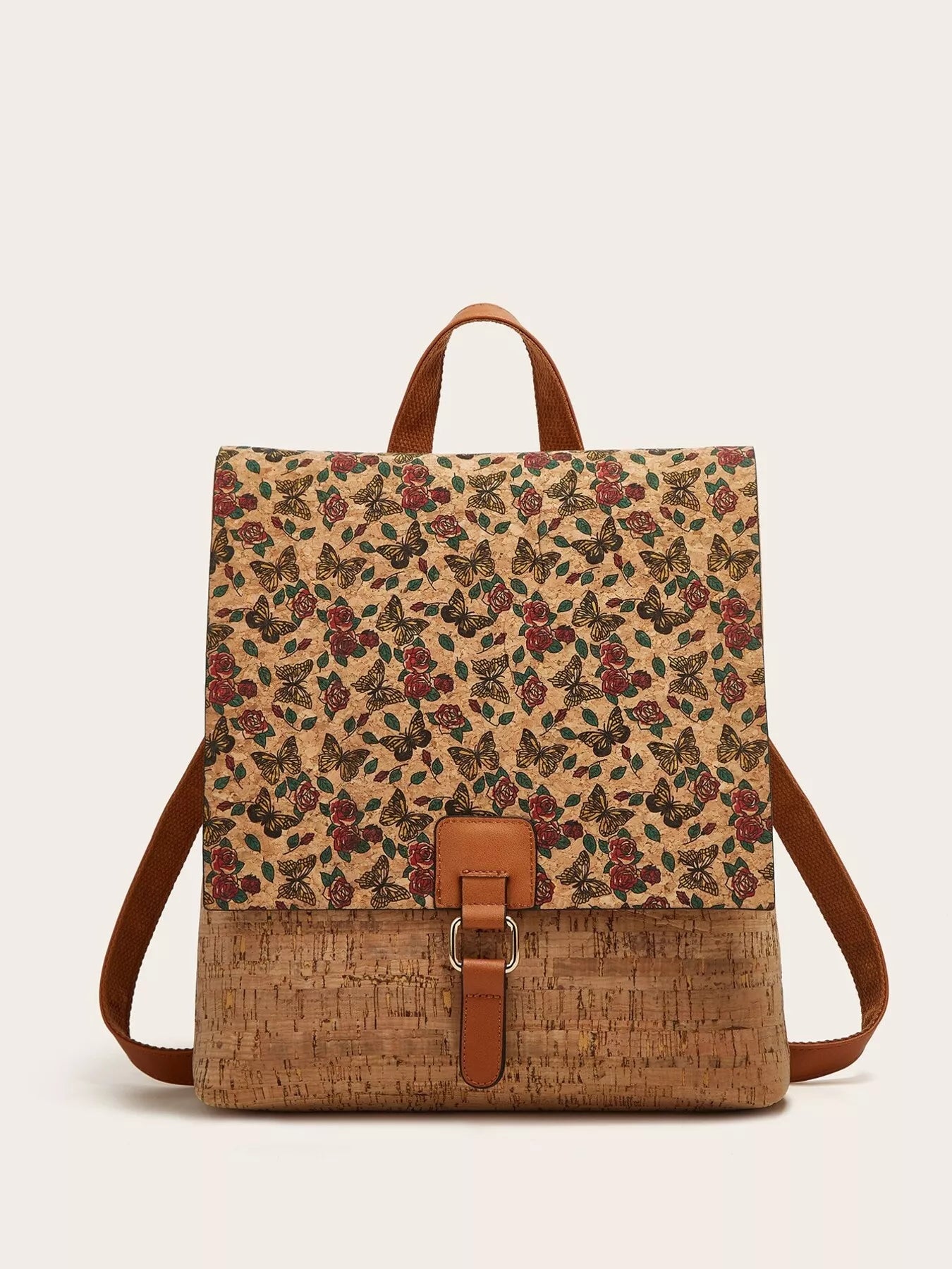 Floral-patterned cork backpack with brown straps on a beige background